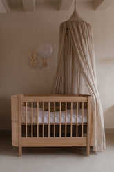 Oliver Furniture Wood Mini+ Cot Bed Excl. Junior Kit Oak – side view