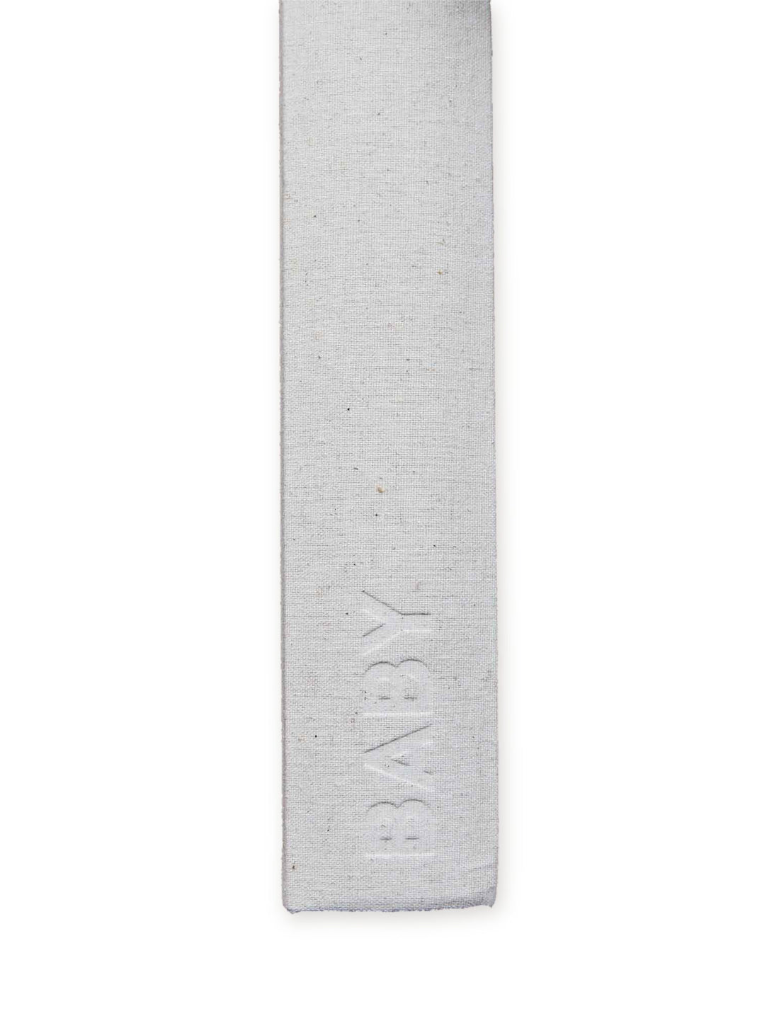 Close-up of the linen spine of the Write to me Photo Album Classic Baby with debossed BABY title, on a white background