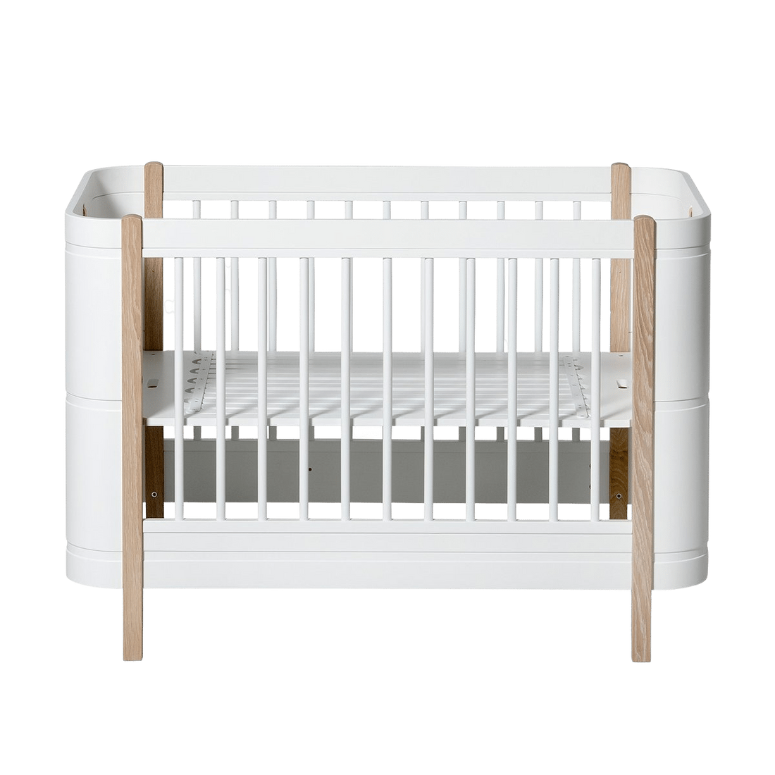 Wood Mini+ Cot Bed Incl. Junior Kit | White/Oak